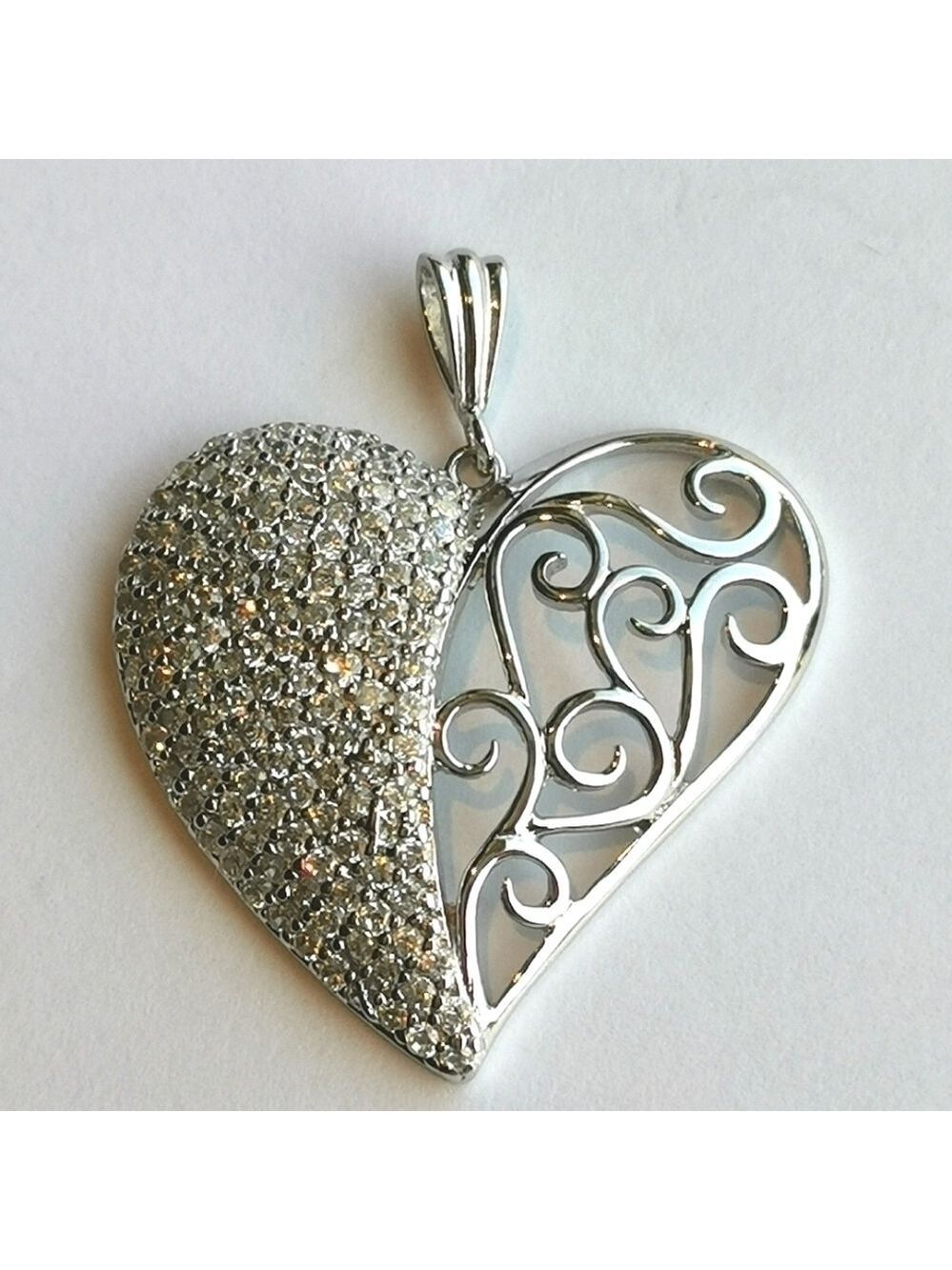 Heart pendant in Sterling Silver filigree and pave set cz
